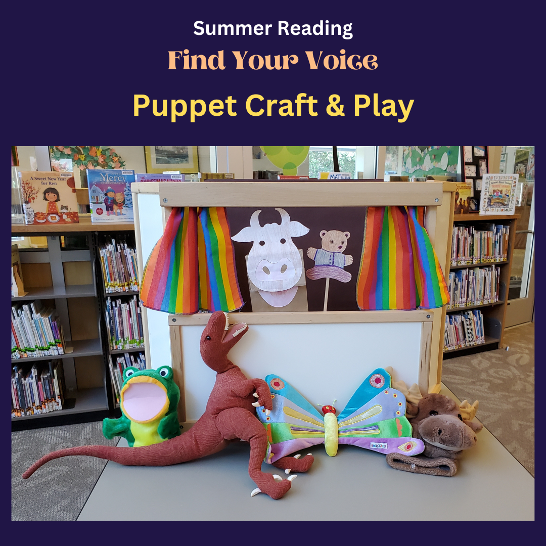 Photograph of small puppet theater with stuffed animals and hand-made puppets