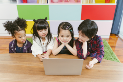 Library Service Early Literacy Computer - 4 small children in front of laptop