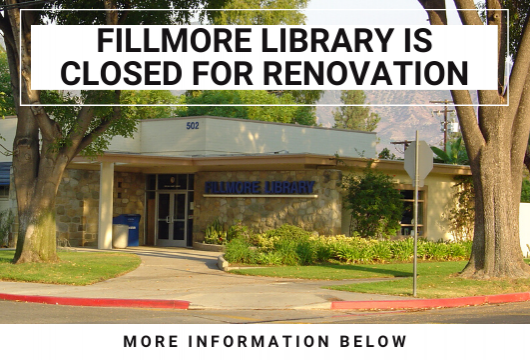 Fillmore Library is closed for renovation - photo is Fillmore Library front door showing a walkway and tall trees