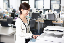 Library Service - Copy Machine - Woman using copy machine