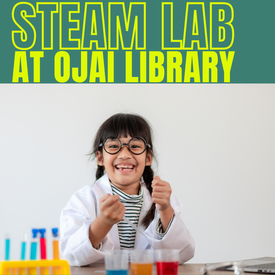 STEAM Lab at Ojai Library. Smiling child in a lab coat with colorful liquids in beakers.