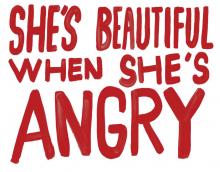 sign reading she's beautiful when she's angry painted in red