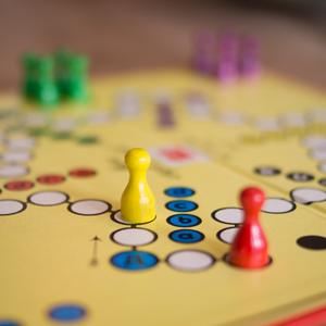 Colorful board game with multicolor pieces