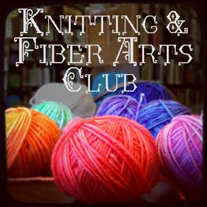 Knitting & Fiber Arts Club. Balls of yarn on a table.