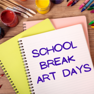 Photo of scattered art supplies and notebooks, with the words "school break art days" written on top notebook.