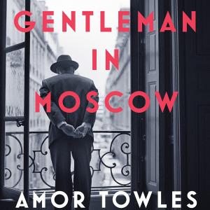 book cover for a gentleman in moscow - black and white photo of a man in a hat looking down from a balcony.