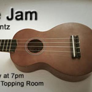 Photo of a ukulele with verbiage: Ukulele Jam with Alan Ferentz - meeting every Monday at 7pm at E.P. Foster Library